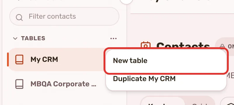 The Tables group in the Contacts rail with its menu open on New table, outlined, and Duplicate My CRM.